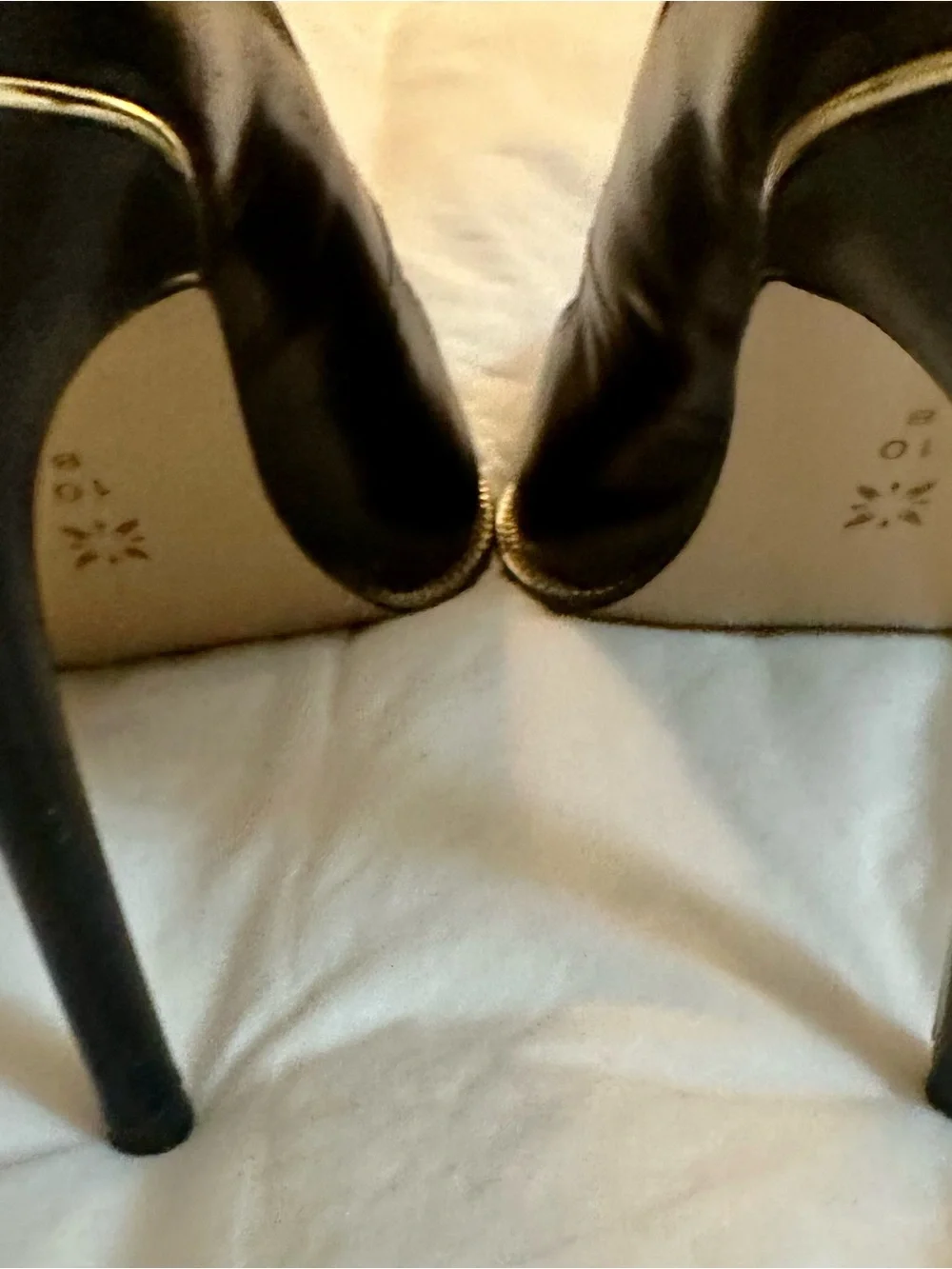 BCBGeneration Black Pointed Toe Pumps with Gold Trim